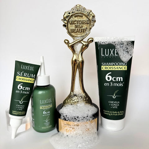 Luxeo hair growth products with a trophy on a white background