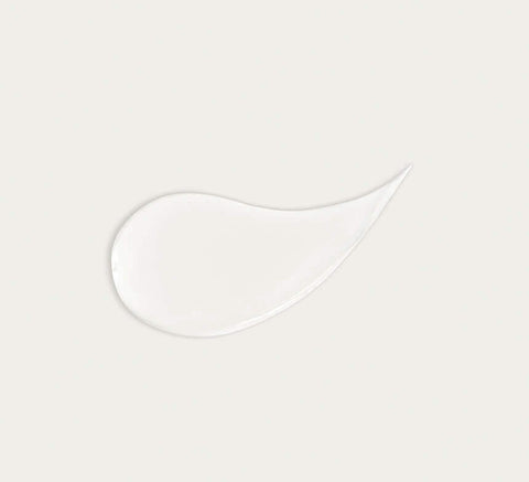 Creamy Strengthening Shampoo texture swatch highlighting niacinamide and panthenol formula.