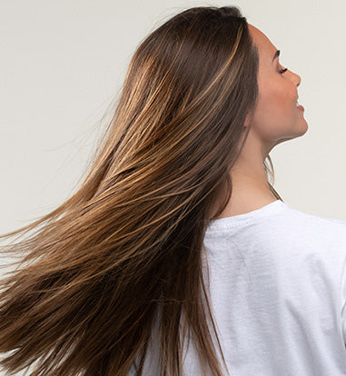 Women who is turning and showing her beautiful hair